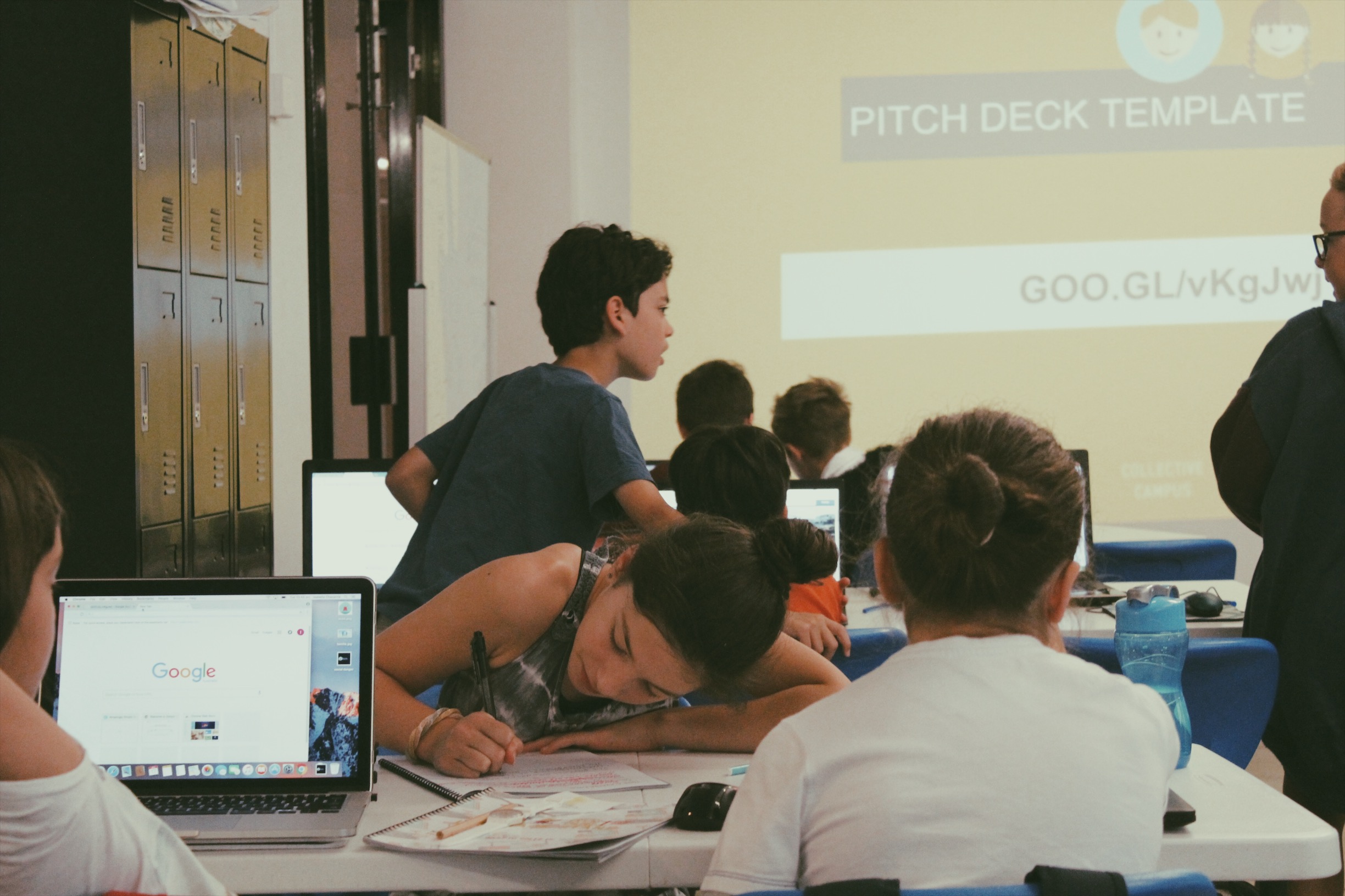 Lemonade Stand Workshop - girl writes down her pitch