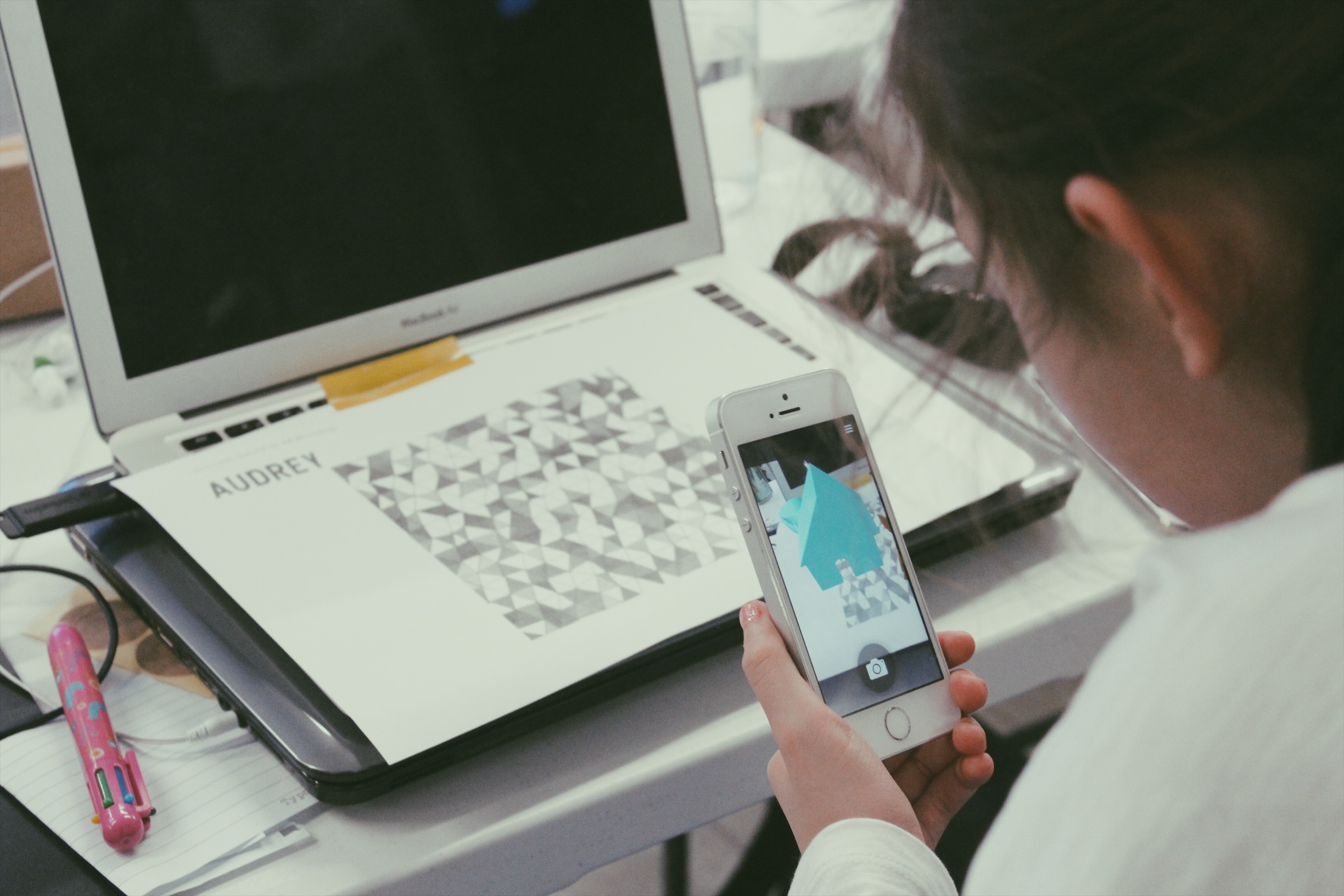 Lemonade Camp: a girl plays with Plattr's AR app